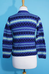 Women's vintage 1970's long sleeve printed zip up sweater in different shades of vibrant blue in a soft wool material. Norwegian style.