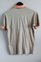 Men's or women's vintage 1990's Polo By Ralph Lauren label short sleeve peach and blue colored stripe polo tee with collar and half button closure.