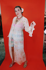 Women's vintage 1980's Valerie Stevens label long sleeve cream sheer lingerie robe with pink floral print, ruffle sleeves, and a tree button closure.