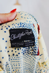 Men's or women's vintage 1970's Christopher Rand long sleeve cream colored polyester material button up shirt with all over farm print.