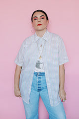 Men's or women's vintage 1970's Towncraft, Penneys label short sleeve white button up shirt with pink, yellow, and grey thin vertical stripes and one left chest pocket.