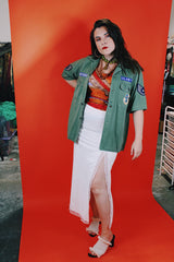 Men's vintage 1960's Guaranteed Trooper Fatigues label short sleeve army green button up shirt or jacket with US Air Force patches all over.