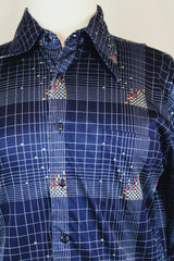 Men's or women's vintage 1970's Chemise Et Cie label long sleeve navy button up shirt with dagger collar and all over multi colored abstract print in slinky shiny polyester material.