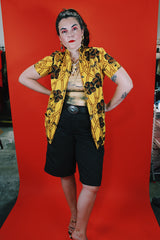 Women's vintage 1970's La Rosa, San Francisco label short sleeve button up blouse in yellow with all over brown Hawaiian print.