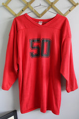 Women's or men's vintage 1970's Southern Athletic label long sleeve red cotton and nylon blend material sport jersey with v shaped neckline and wording on front and back.