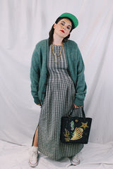 Women's or men's vintage 1970's Alps, Rugged Outdoors, Merrimac Valley, New England label long sleeve green colored button up cardigan.
