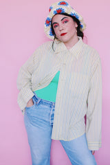 Women's or men's vintage 1960's Hickok label long sleeve light lime green button up pajama shirt with vertical stripes and one left chest pocket.