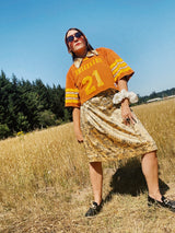 short sleeve gold silky printed dress knee length vintage 1960's with collar and v neck