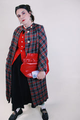 Women's vintage 1960's long label long length plaid tartan print jacket in black and red with gold buttons. Fully lined and has side pockets.