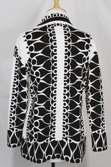 Women's vintage 1970's Brookvalley by Fairfield label long sleeve button up blouse in white with an all over abstract brown colored print.