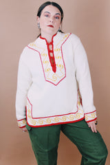 Women's vintage 1970's New Improved Kimlon by RBK Importers label size medium long sleeve white acrylic pullover sweater with half closure and red and yellow trim.