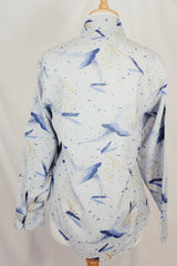 Men's vintage 1980's Landmark label long sleeve button up shirt in light baby blue with all over abstract prints.