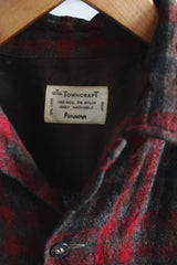 Men's vintage 1960's Towncraft, Penneys, Made in Japan label size medium long sleeve button up wool shirt. All over red and brown plaid print. Two chest pockets.