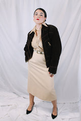 Men's or women's vintage 1970's long sleeve short length chocolate brown jacket in a fuzzy soft suede material. Gold hardware, zipper up the front, contrast stitching, and dagger collar.
