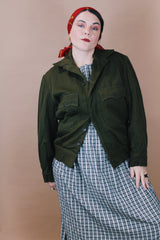 Men's vintage 1950's Caleb V. Smith & S, New York label size large dark green wool cropped fit long sleeve button up jacket with brown shearling liner.