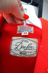 Men's or women's vintage 1960's US Doe-Lon, The Finest Fashion in VINYL label long sleeve red and white varsity letterman jacket with snap buttons and pockets.