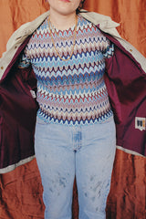 Women's or men's vintage 1970's Styled by William Barry label long sleeve grey colored suede jacket with maroon colored liner and popper buttons.