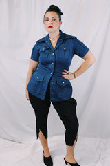 Women's vintage 1970's K Mart, Satisfaction Always, Made in Japan label navy blue shirt with dagger collar, silver popper buttons, and lots of pockets.