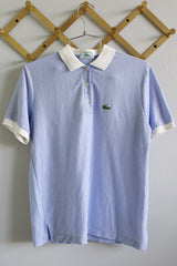 Women's or men's vintage 1980's Izod Lacoste label short sleeve polo tee with white collar and trim, three button closure, side slits.