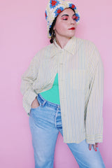 Women's or men's vintage 1960's Hickok label long sleeve light lime green button up pajama shirt with vertical stripes and one left chest pocket.