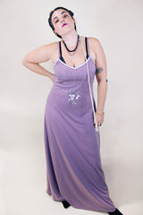 Women's vintage 1980's sleeveless ankle length purple dress with spaghetti straps and bead and sequins across chest.