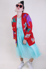 Women's vintage 1980's Mr. Girasol, Made in Mexico label long sleeve open front lightweight jacket in red with all over multicolored animals.