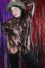 Women's vintage 1980's Made in USA long sleeve button up blouse with two chest pockets and pearly buttons.