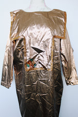 Women's vintage 1980's Original by Freida label long sleeve long length bronze metallic costume dress with a bib in front and back.