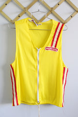 Women's or men's vintage 1970's Hondaline Sportswear sleeveless zip up nylon mesh vest in yellow with red and white trim. Honda patch on left chest.