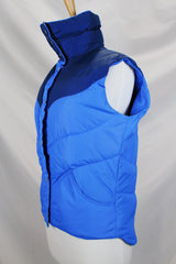 Women's vintage 1980's Tempco, Down Insulated, By Tempco Quilters Seattle, Made in USA label sleeveless navy and blue nylon puffy vest with popper buttons.