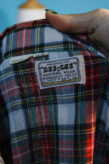 Men's vintage 1970's Washington Dee-Cee Western Wear, Made in USA label long sleeve button up plaid shirt with pearl silver snap buttons. Western style in white, red, and green colors.