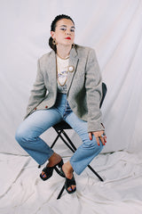 Men's or women's vintage 1960's Nordstrom, Harris Tweed, Tailored in the USA label long sleeve grey colored wool blazer with front pockets and partial lining.