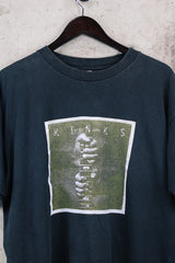 Women's or men's vintage 1997 Gildan Heavyweight, Made in Canada label short sleeve black The Kinks' Ray Davies The Storyteller tour tee with colored graphic and text on front and back.