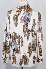 Women's vintage 1970's matching novelty print sleeveless tank top and button up blouse with dagger collar. All over novelty print in white and brown colors.