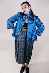 Women's vintage 1960's long sleeve vibrant blue satin robe jacket with a mandarin collar and overall ditsy print.