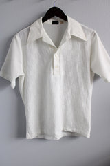Men's or women's vintage 1970's Towncraft Designer Collection JCPenney label short sleeve white polo top with collar and half button closure in lightweight polyester.