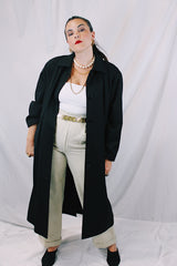 Women's vintage 1990's Nordstrom - Point of View label long sleeve long length black trench coat in a wool material. Fully lined, side pockets, back slit, and shoulder pads.