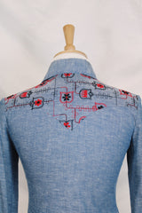 Women's vintage 1970's Western Trends by Panhandle Slim, Made in USA label long sleeve chambray denim top with black and white embroidery.