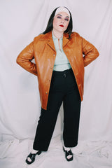 Men's or women's vintage 1970's Grodins label long sleeve tan light brown buttery leather jacket with button closure. Western style.