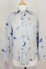 Men's vintage 1980's Landmark label long sleeve button up shirt in light baby blue with all over abstract prints.
