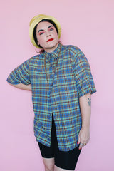 Men's or women's vintage 1980's Marc David Clothing label short sleeve button up collared shirt in a blue and green plaid print.