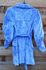 Women's vintage 1970's long sleeve long length pale blue crushed velvet jacket. Puff sleeves and matching tie belt.