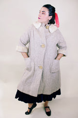 Women's vintage 1960's Mademoiselle Vogues, Fashions in Good Taste 3/4 arm length knee length coat in a wool cream color and cream fur trim on neckline and cuffs.