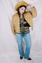 Men's or women's vintage tan colored long sleeve suede jacket by JCPenney. Popper buttons and contrast stitching and fully lined.