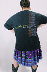 Women's or men's vintage 1996 Made in El Salvador label short sleeve black Steely Dan tour tee with multicolored graphic on front and back.