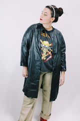 Women's vintage 1970's Dan Di Modes label mod style black leather jacket with leather buttons and pockets.