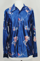 Men's or women's vintage 1970's Montgomery Ward label shiny vibrant navy blue button up shirt with dagger collar and all over floral print.