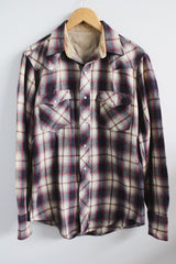 Men's vintage 1970's medium size long sleeve button up shirt in wool. Cream, navy, and red all over plaid print. Pearl popper buttons.