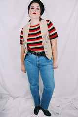 Women's vintage 1990's BB Dakota Leatherwear label light tan colored suede leather vest with fringe detail and silver buttons