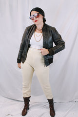 Men's or women's vintage 1950's cream colored wool material military long john underwear. Ribbed ankles and elastic waistband.